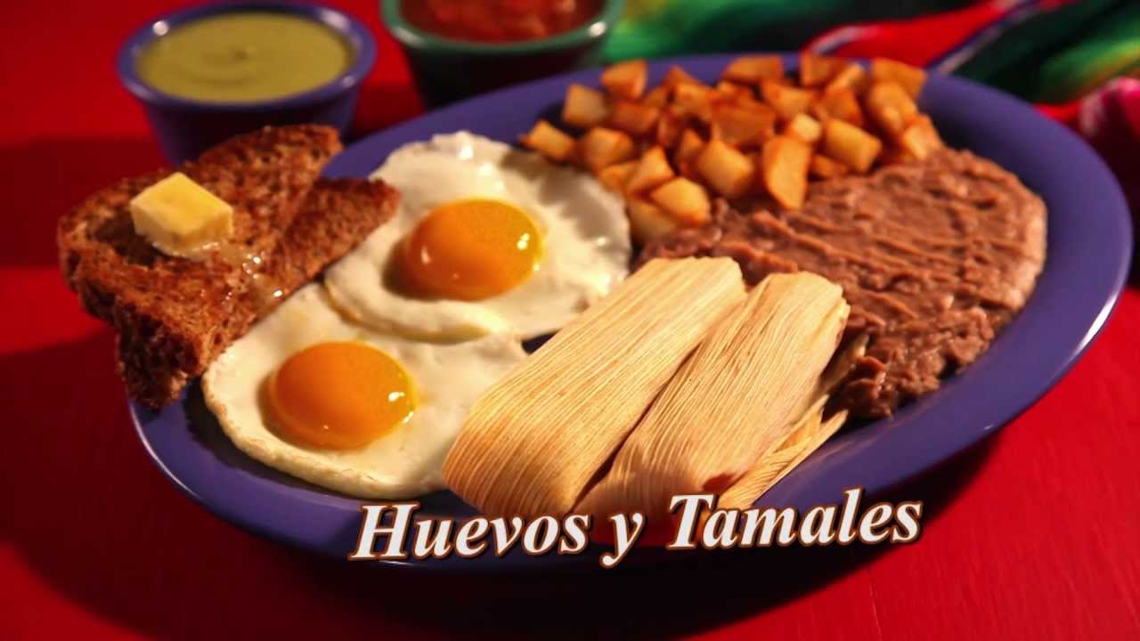 Tamales with fried eggs and frijoles (source: http://i1.ytimg.com/vi/XUSdnmJaRKY/maxresdefault.jpg)